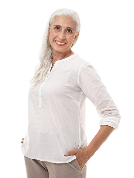 Portrait of beautiful mature woman on white background - Foto, afbeelding