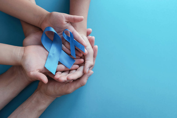 Light blue ribbons with mustache on blue background , Prostate C - Foto, Imagem