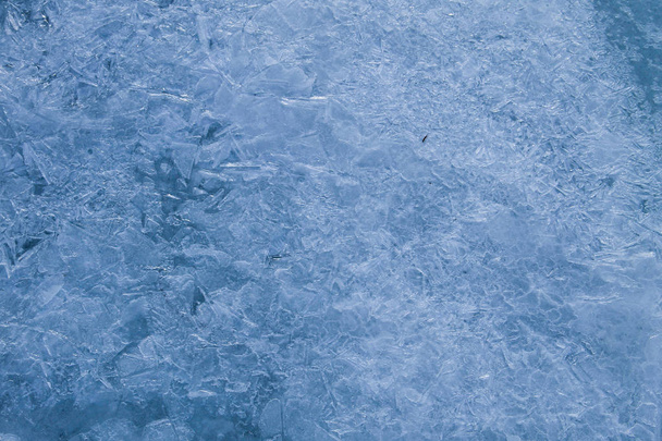 Textuur van het ijs oppervlak. Winterachtergrond - Foto, afbeelding