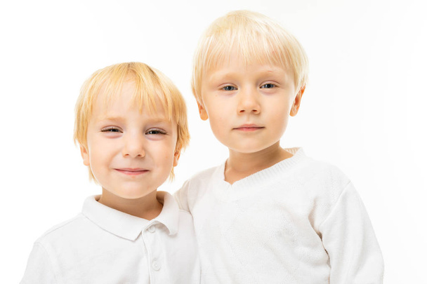 close up portrait of two little brothers  - 写真・画像