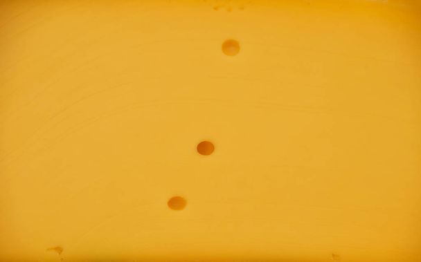 Közelkép a kemény gouda sajt háttér - Fotó, kép
