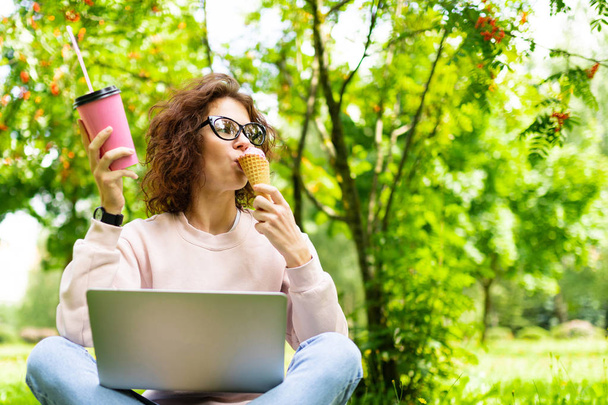 girl with ice cream, coffee and laptop outdoors - Φωτογραφία, εικόνα