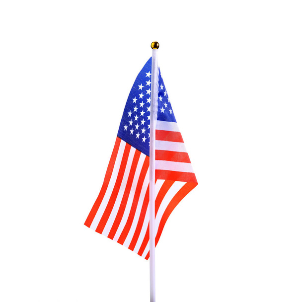 Amerikai asztal zászló-ra egy fehér háttér. A kormány az amerikai tárgyalási vagy híreket. Egy elszigetelt objektum a hivatalos amerikai rendezvények megtervezésén. - Fotó, kép