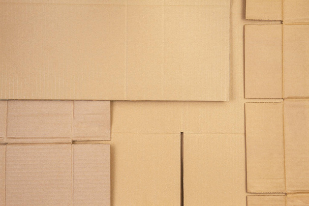 Régi használt hullámkarton csíkos karton dobozok alkatrészek háttér - Fotó, kép