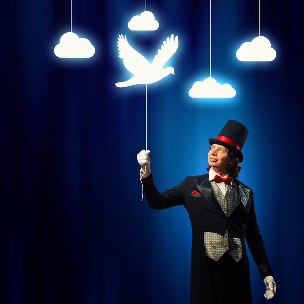 Magician in hat - Фото, зображення