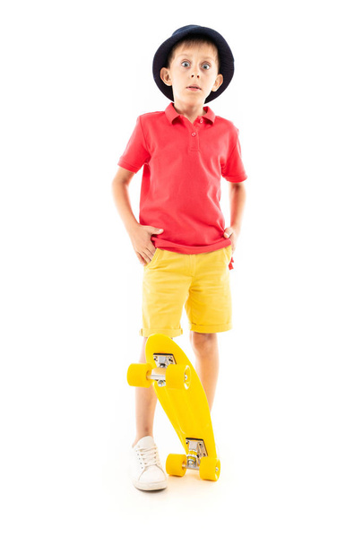 boy posing with skate in studio  - Photo, Image