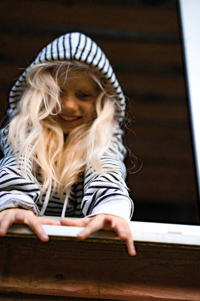 blonde little girl at weekend in the country, happy childhood concept - Valokuva, kuva