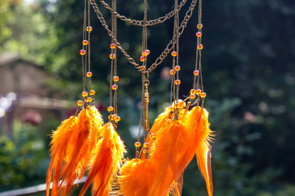 Handmade dream catcher with feathers threads and beads rope hanging - Foto, Imagem