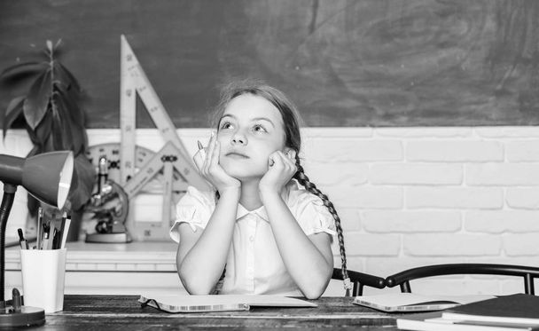 thoughtful child. small child in classroom. digital age with modern technology. small girl study with in school. Formal informal and nonformal education. future success is studying. back to school - Fotografie, Obrázek