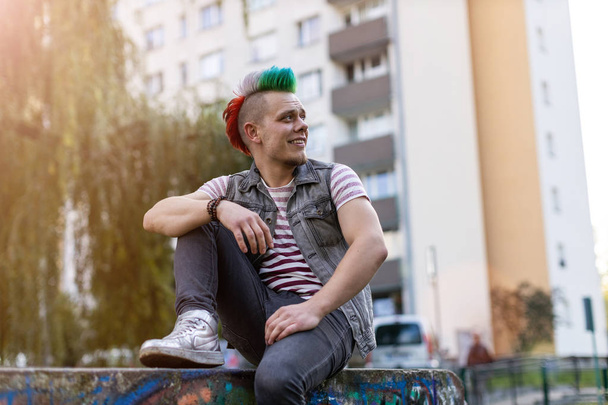 Portrait of a cool young man with mohawk hair - Photo, Image