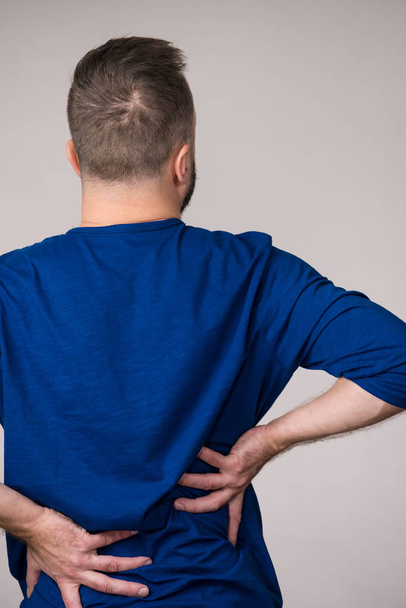 Man having back loins pain ache - Fotoğraf, Görsel