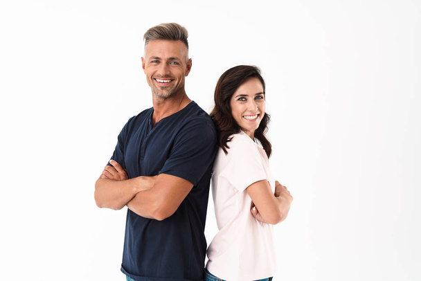 Cheerful couple wearing casual outfit standing isolated - Photo, image