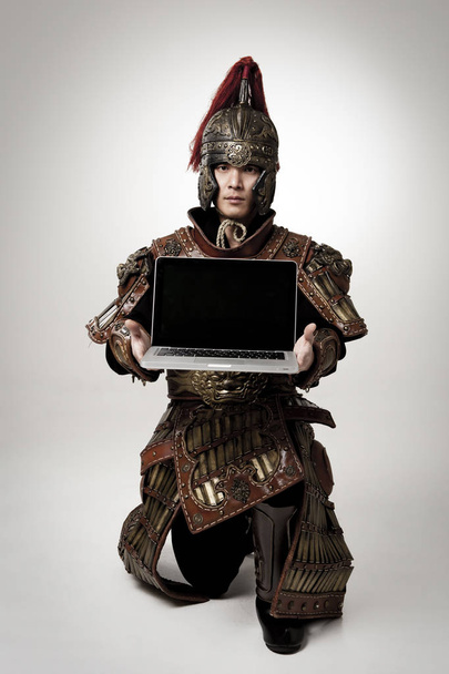 Adult male wearing very old armor. - Zdjęcie, obraz