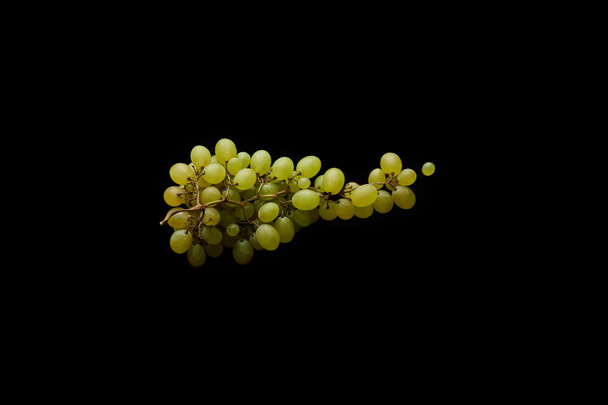 top view of ripe green grape isolated on black - Fotó, kép