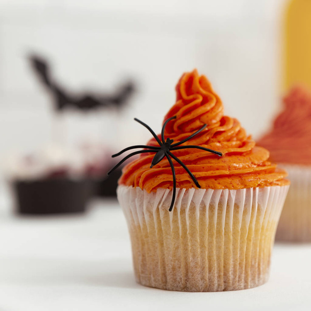 Tasty cup cake with season pumpkin decoration - Фото, изображение