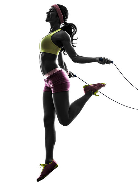 woman exercising fitness jumping rope silhouette - 写真・画像