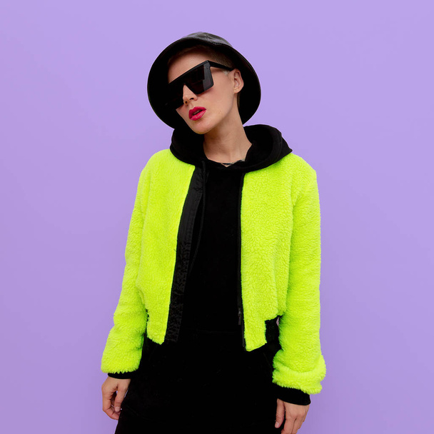 Hipster girl in a stylish street look. Fashion jacket and access - Φωτογραφία, εικόνα