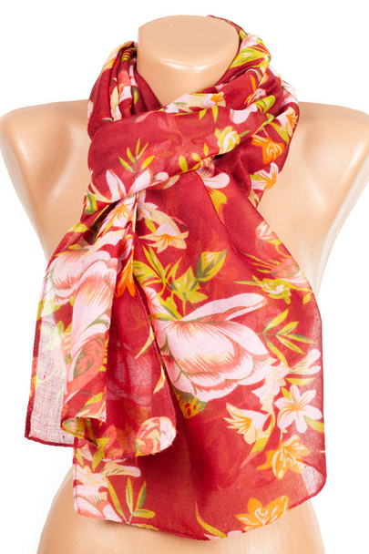Red silk scarf on mannequin isolated on white background. - Photo, Image