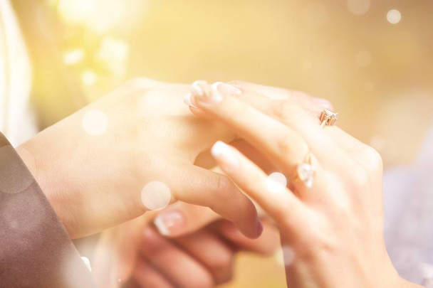 Groom Putting Wedding Ring on bride - Фото, изображение