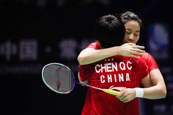 Chinese professional badminton players Jia Yifan and Chen Qingchen compete against Japanese professional badminton players Misaki Matsutomo and Ayaka Takahashi at the final of women's doubles at VICTOR China Open 2019, in Changzhou city, east China's - Fotoğraf, Görsel