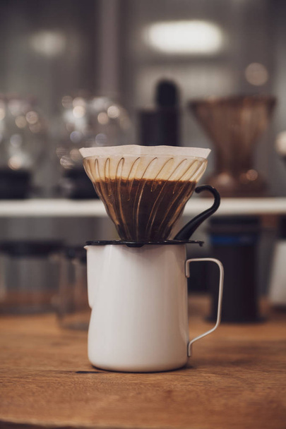 Pour over coffee in funnel. Alternative method - Foto, afbeelding