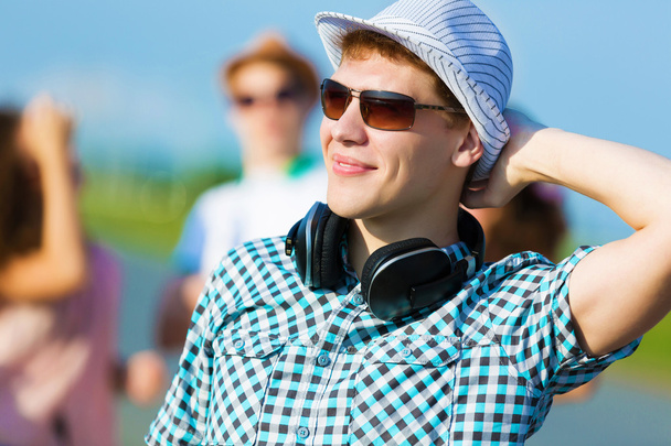 Young man with headphones - Fotografie, Obrázek