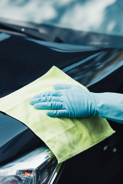 cropped view of car cleaner wiping car with rag - Фото, зображення