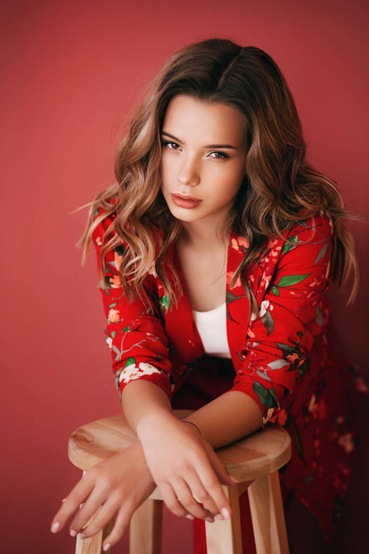 beautiful young woman in red jacket - Photo, Image