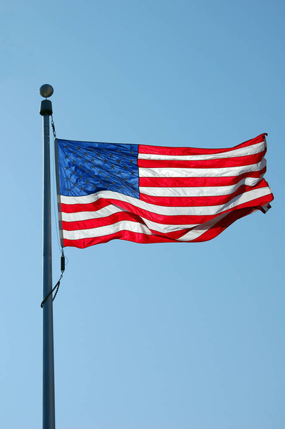 American flag against blue sky - Φωτογραφία, εικόνα