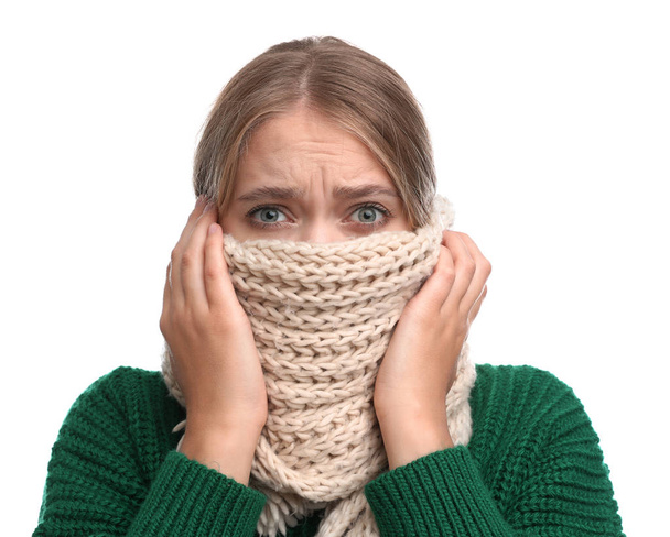Young woman suffering from cold on white background - Photo, image