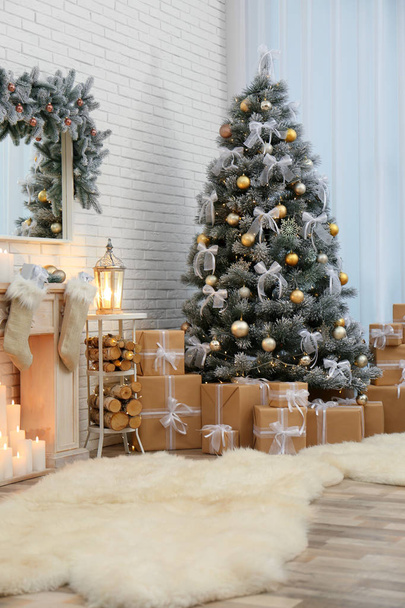 Decorated Christmas tree in modern living room interior - Φωτογραφία, εικόνα