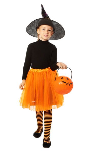 Cute little girl with pumpkin candy bucket wearing Halloween costume on white background - Valokuva, kuva