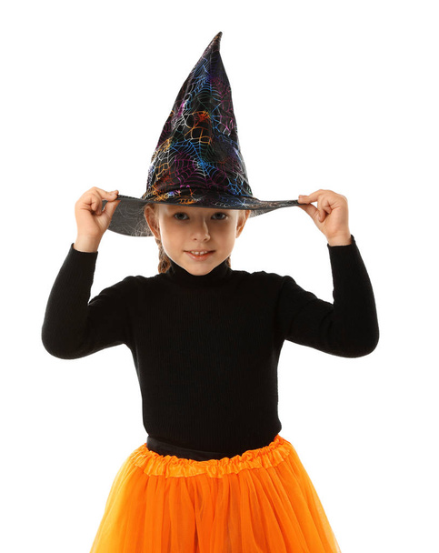 Cute little girl wearing Halloween costume on white background - Photo, Image