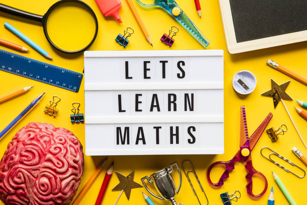 Lets learn maths lightbox message on a bright yellow background - Photo, Image