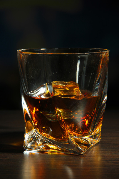 Glass of whiskey, on dark background - Fotografie, Obrázek