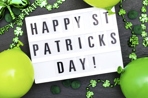 Happy st Patrick's day lightbox message with green decorations - Zdjęcie, obraz
