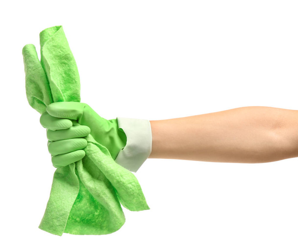 Nő kéz a kesztyűben gazdaság takarítás rongy fehér háttér - Fotó, kép