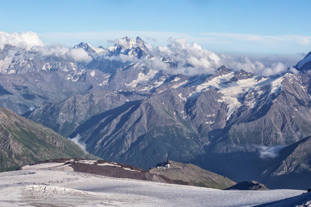 Mountainous landscape, Elbrus, climbing the elbrus, clouds. - Фото, изображение
