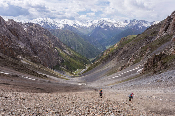 hikers hiking in the mountains - Fotó, kép