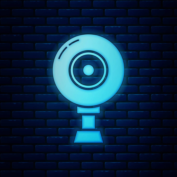 Leuchtende Neon-Web-Kamera-Symbol isoliert auf Backsteinwand Hintergrund. Chat-Kamera. Webcam-Symbol. Vektorillustration - Vektor, Bild