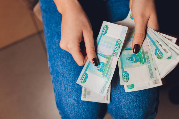 Russian rubles in the hands of a business woman. - Fotoğraf, Görsel