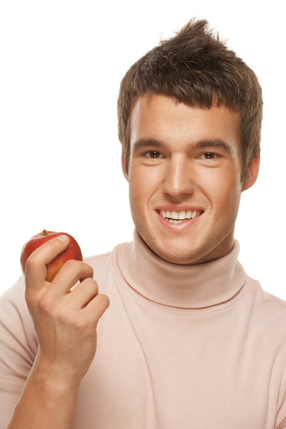 Ritratto di giovane con mela rossa in mano
 - Foto, immagini