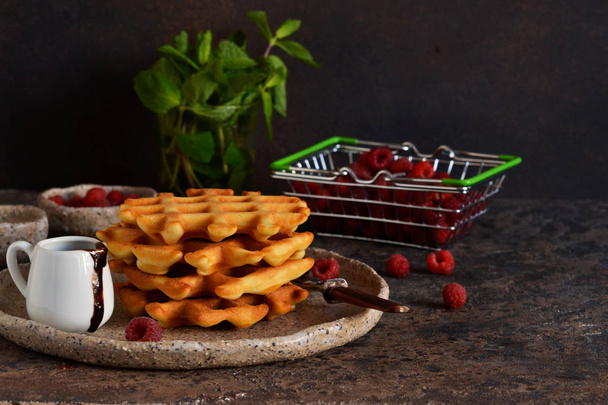 Homemade waffles with chocolate sauce and berries  - Foto, Imagen