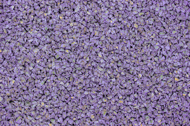 Lila violetti kumi pinnoite lasten leikkipaikka. Rakenne rakeinen tausta. Ulkona lattiapäällysteen urheilu kunto pelit
 - Valokuva, kuva