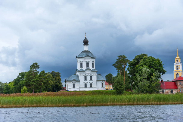 Picturesque view of Nilo Stolobensky Monastery on Lake Seliger, Tver region, Russia. Panoramic view of Nilo Stolobensky Monastery, Tver region, Russia. - Photo, image