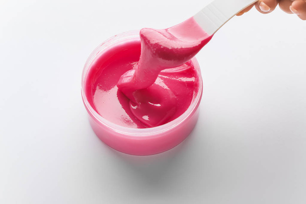 Sugaring paste for hair removal on white background - Φωτογραφία, εικόνα