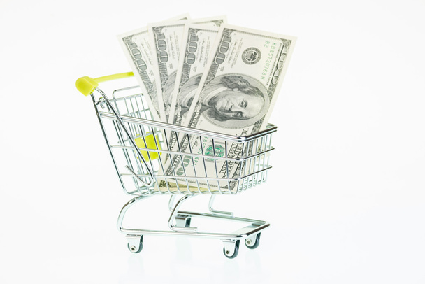 US dollars in shopping cart - Фото, зображення