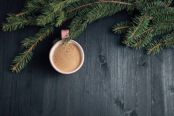 Cup of coffee on black wooden background - Фото, зображення