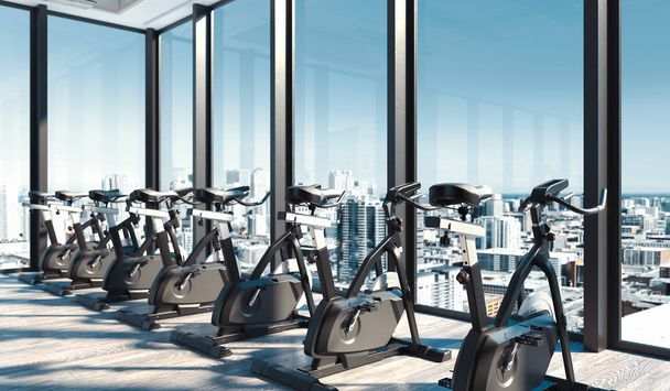 Modern gym with exercise bikes near big panoramic windows in skyscraper, 3d rendering. - Foto, immagini