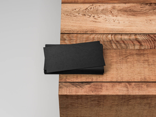 Black textured blank business cards on wooden cube, 3d rendering - Foto, Imagem